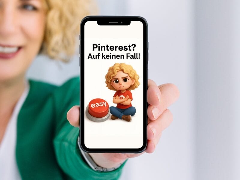 Eine Person hält ein Smartphone in der Hand, auf dem die Karikatur eines stirnrunzelnden Lockenkopfes zu sehen ist, der im Schneidersitz neben einem "easy"-Button sitzt. Auf keinen Fall!" darüber.